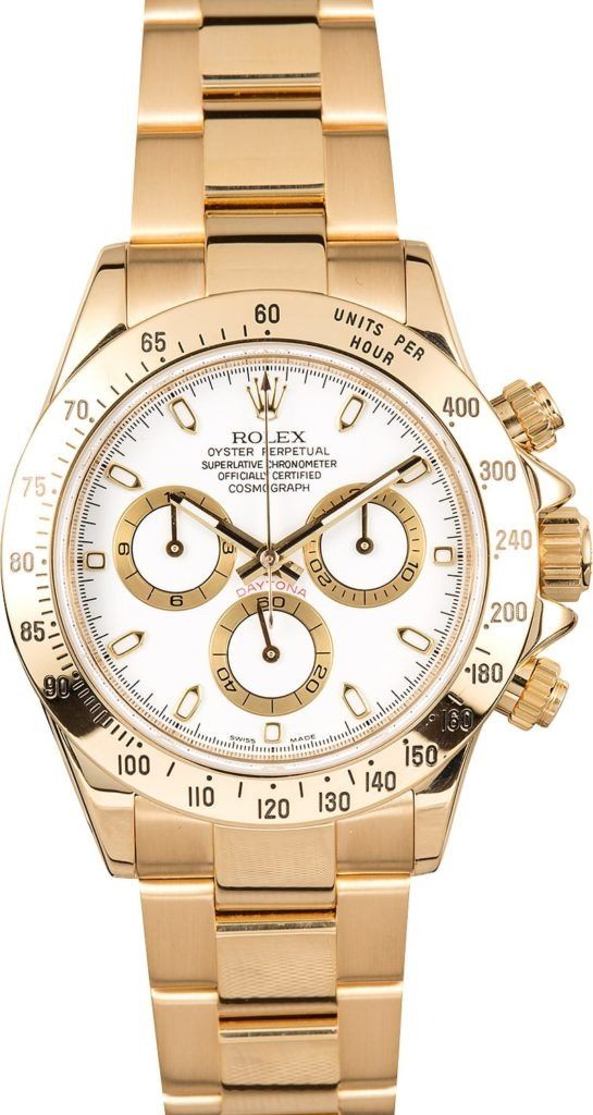 Gold Rolex Daytona watch with white dial and three subdials on a matching gold bracelet