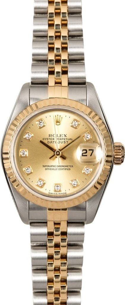 Two-tone gold and silver wristwatch with a round gold dial and date display