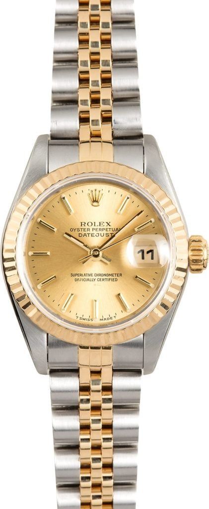 Two-tone gold and silver wristwatch with a round gold face and date window
