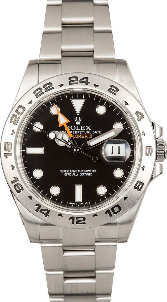 Silver Rolex watch with black dial and date window on metal band