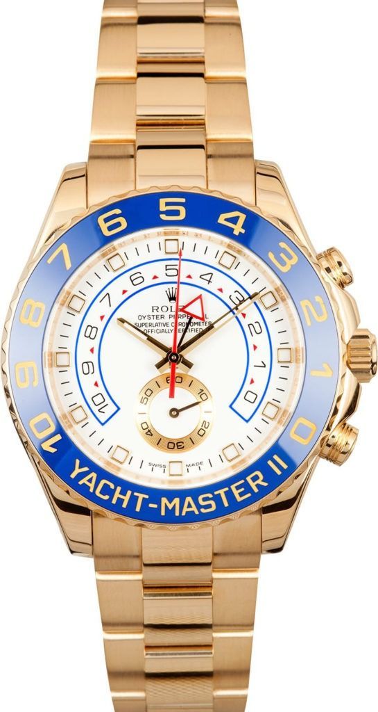 Gold Rolex Yacht-Master watch with blue bezel and white dial on a metal bracelet