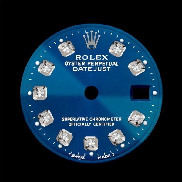 Blue Rolex Oyster Perpetual Datejust dial with silver hour markers and a date window cutout