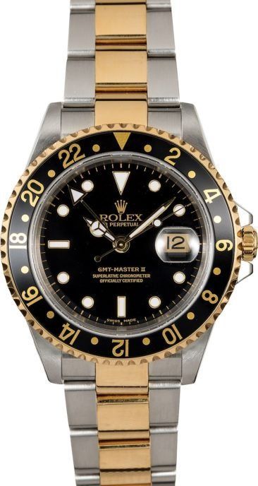 Two-tone Rolex GMT-Master II watch with black dial and gold bezel, centered on white background