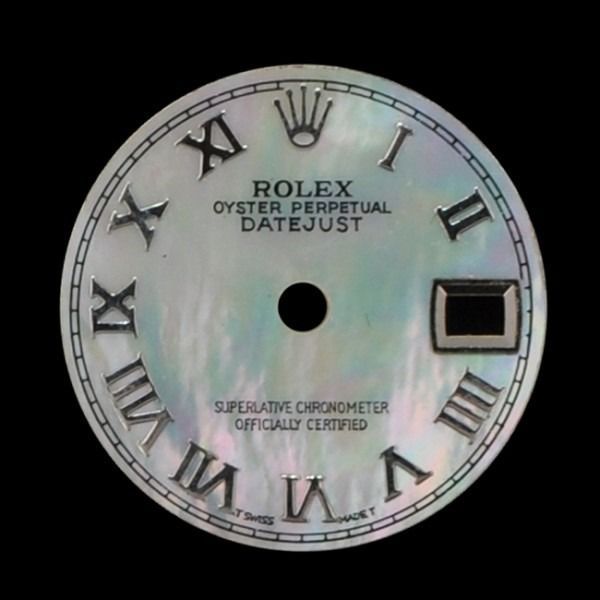 Close-up of a Rolex Oyster Perpetual Datejust watch dial with Roman numerals and a date window