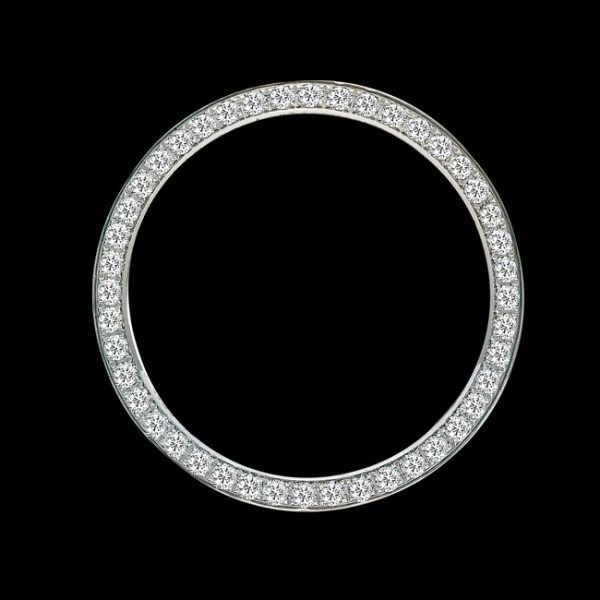 Silver diamond-studded ring on a black background