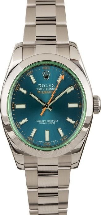 Silver Rolex watch with a teal dial and metal bracelet on a white background