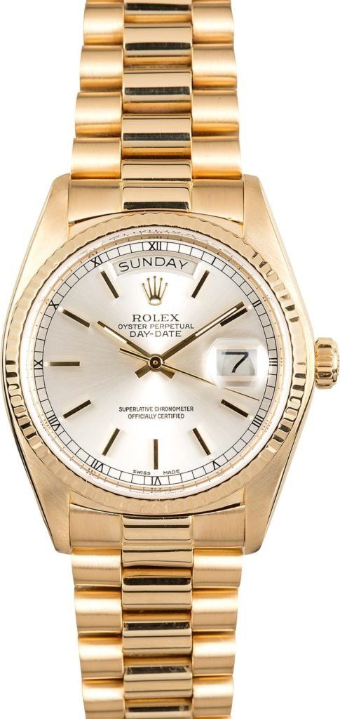 Gold wristwatch with white dial and date display on a gold metal band