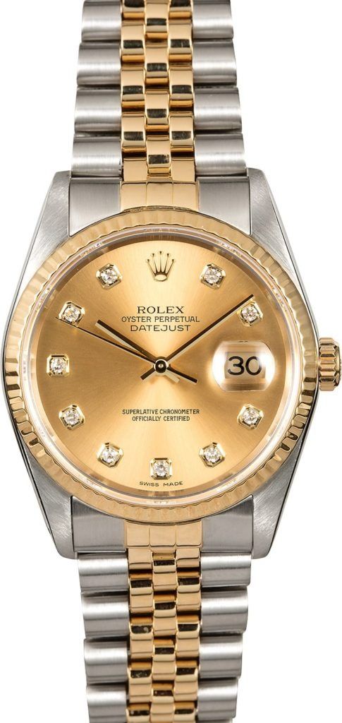 Two-tone gold and silver Rolex wristwatch with a diamond dial and date display
