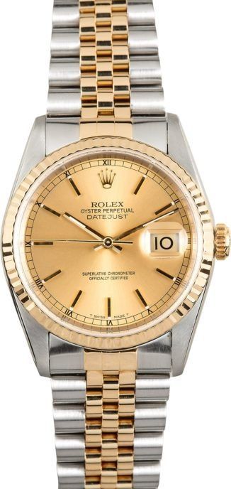Two-tone gold and silver Rolex wristwatch with a champagne dial and date display.