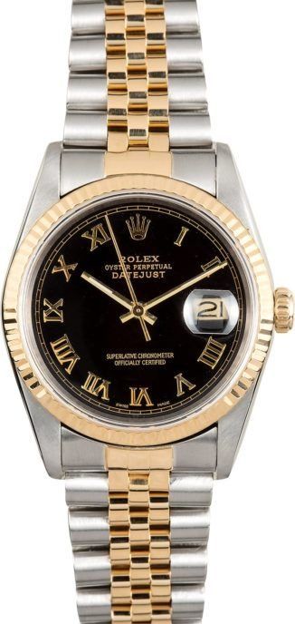 Two-tone Rolex watch with black dial, gold accents, and date magnifier on the right side