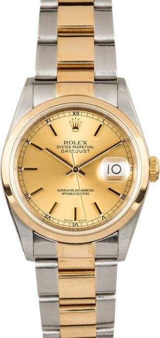 Two-tone gold and silver Rolex wristwatch with a champagne dial and date window