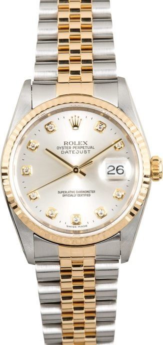 Two-tone Rolex watch with white dial, gold accents, and date display