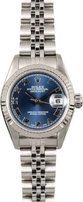 Silver wristwatch with blue dial and date display on a metal link bracelet