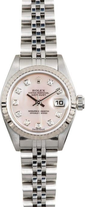 Pink Rolex wristwatch with diamond hour markers and silver bracelet on white background