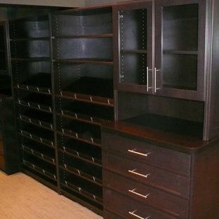 A closet with lots of shelves and drawers