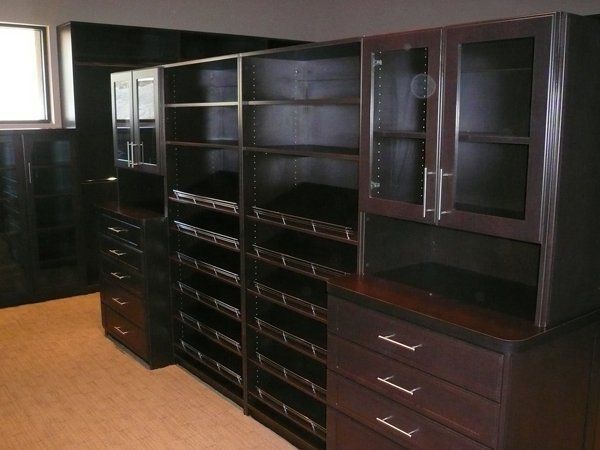 A room with a lot of shelves and drawers