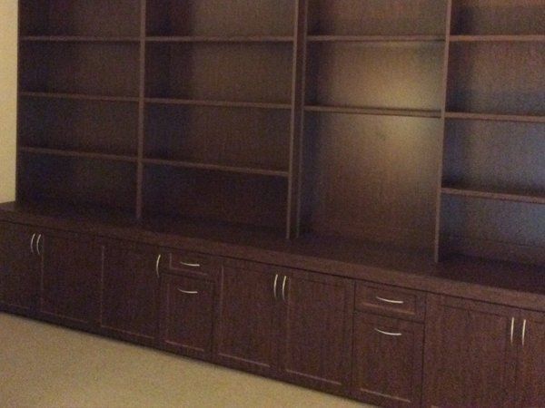 A room with a lot of shelves and cabinets