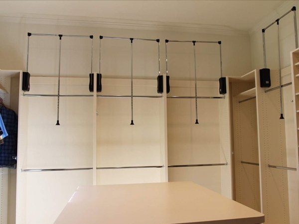 A closet with a table in the middle of it