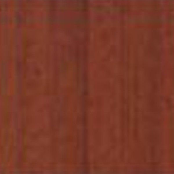 A close up of a piece of red wood.