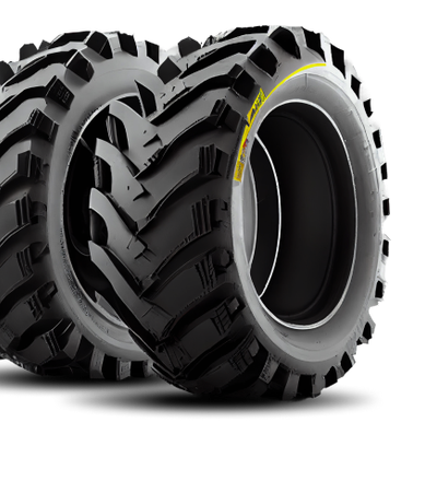 Two black off-road tires with deep tread, one angled in front of the other on a white background