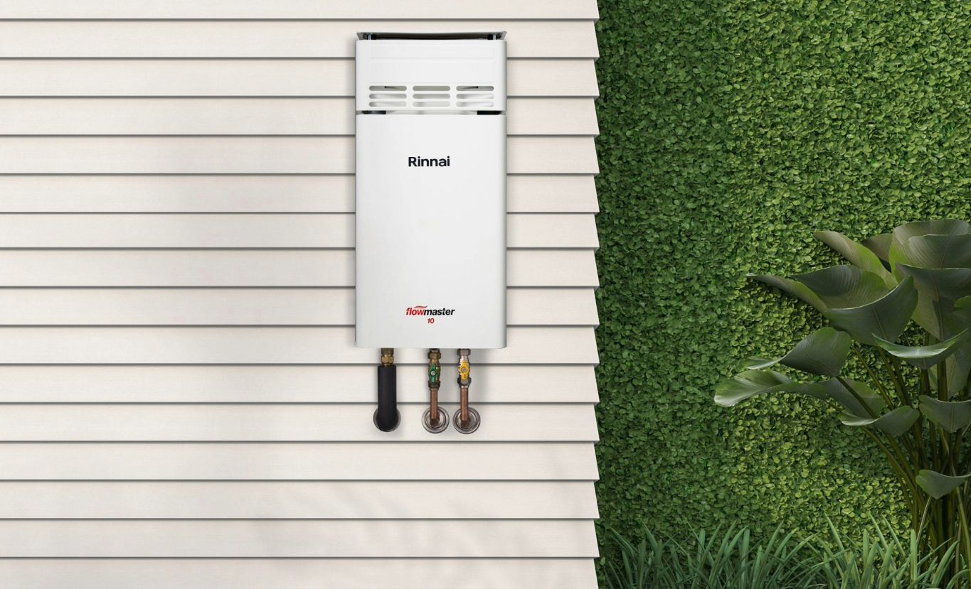 White Tankless Water Heater Mounted — Forster Hotwater in Old Bar, NSW