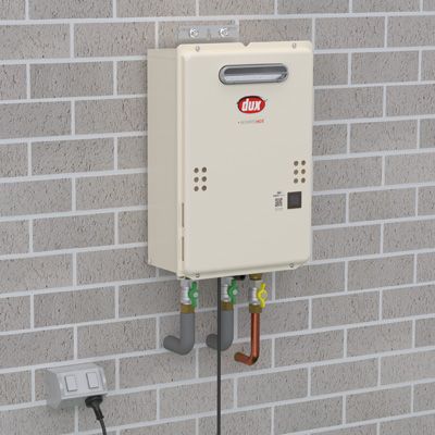 Wall-mounted Beige Utility Heater on a Gray Brick Wall — Forster Hotwater in Hallidays Point, NSW