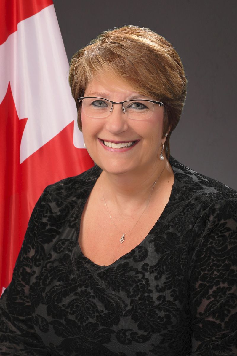 A man wearing a black shirt with the word instructor on it