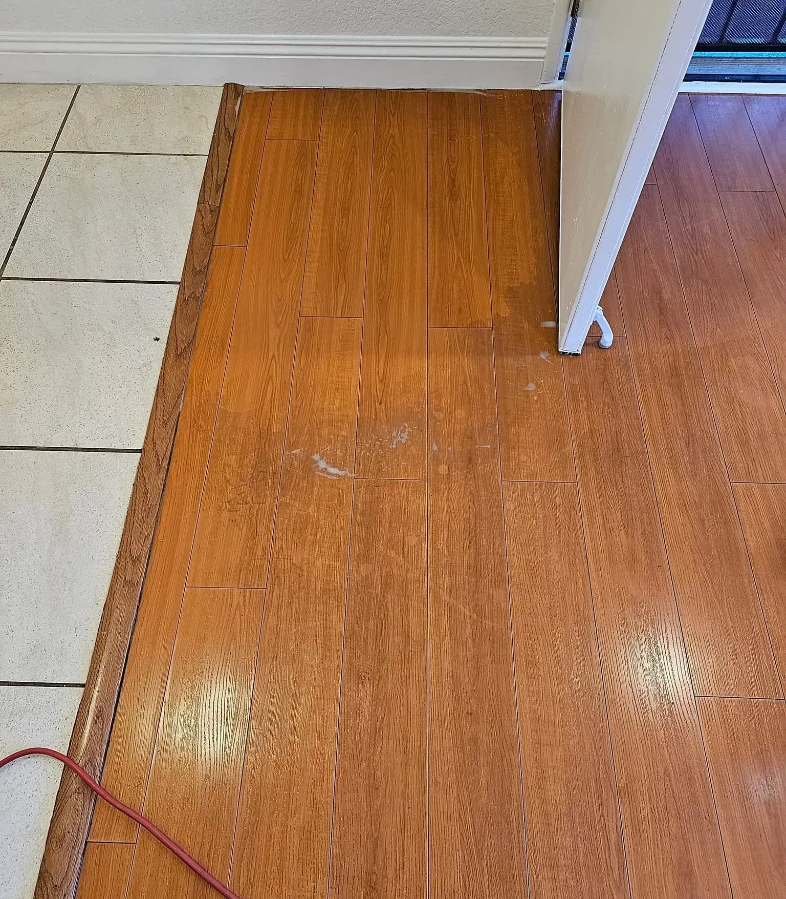 An aerial view of a city skyline with lots of tall buildings and trees.