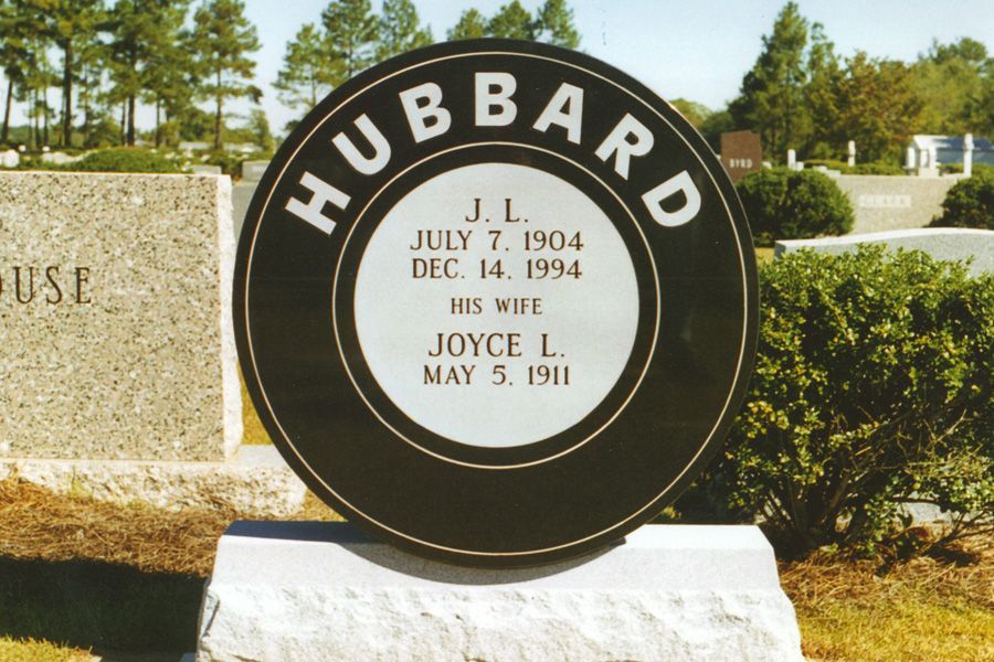 A grave marker for j.l. hubbard and his wife joyce l.