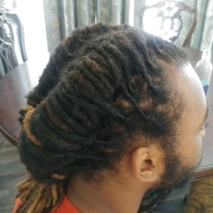 Side of a Traditional Dreadlocks Hairstyle — Katy, TX — Loc'd In Beauty
