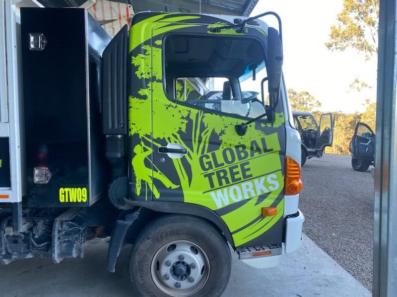 Truck Cab With Lime Green and Black Graphics — Boss Signs & Tint in Gympie, QLD