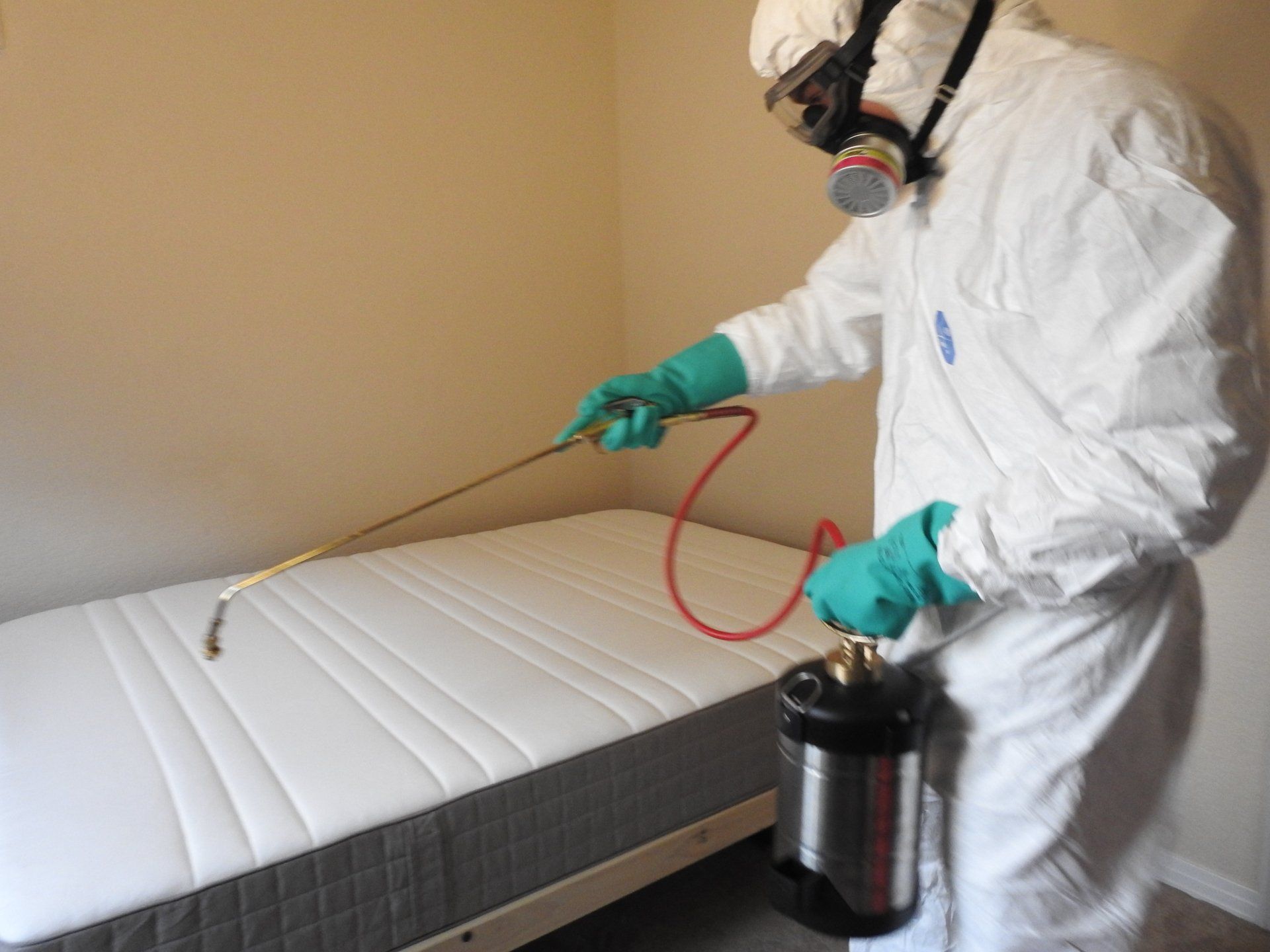 Pest Control Worker with Spraying Equipment — Parker, CO — Konold Pest Control