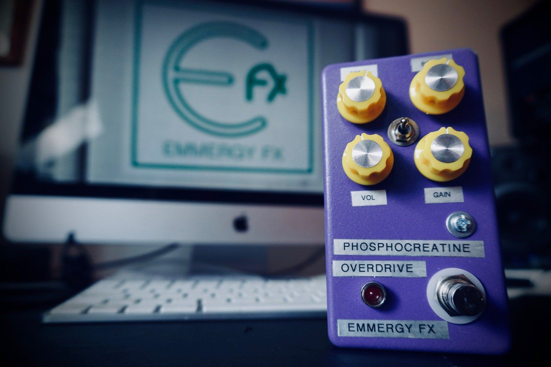 blue guitar pedal on a table