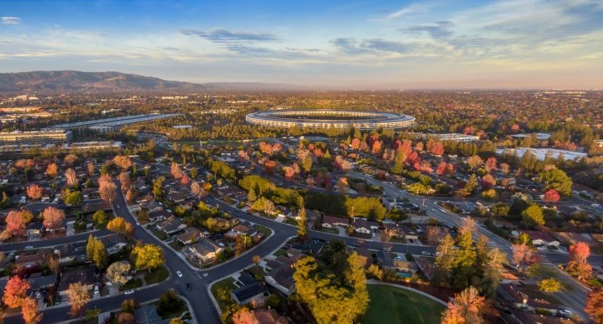 Aerial view of Apple Park in Santa Clara, CA surrounded by residential neighborhoods.