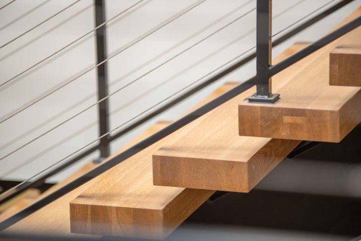 Wood and metal staircase highlighting design details