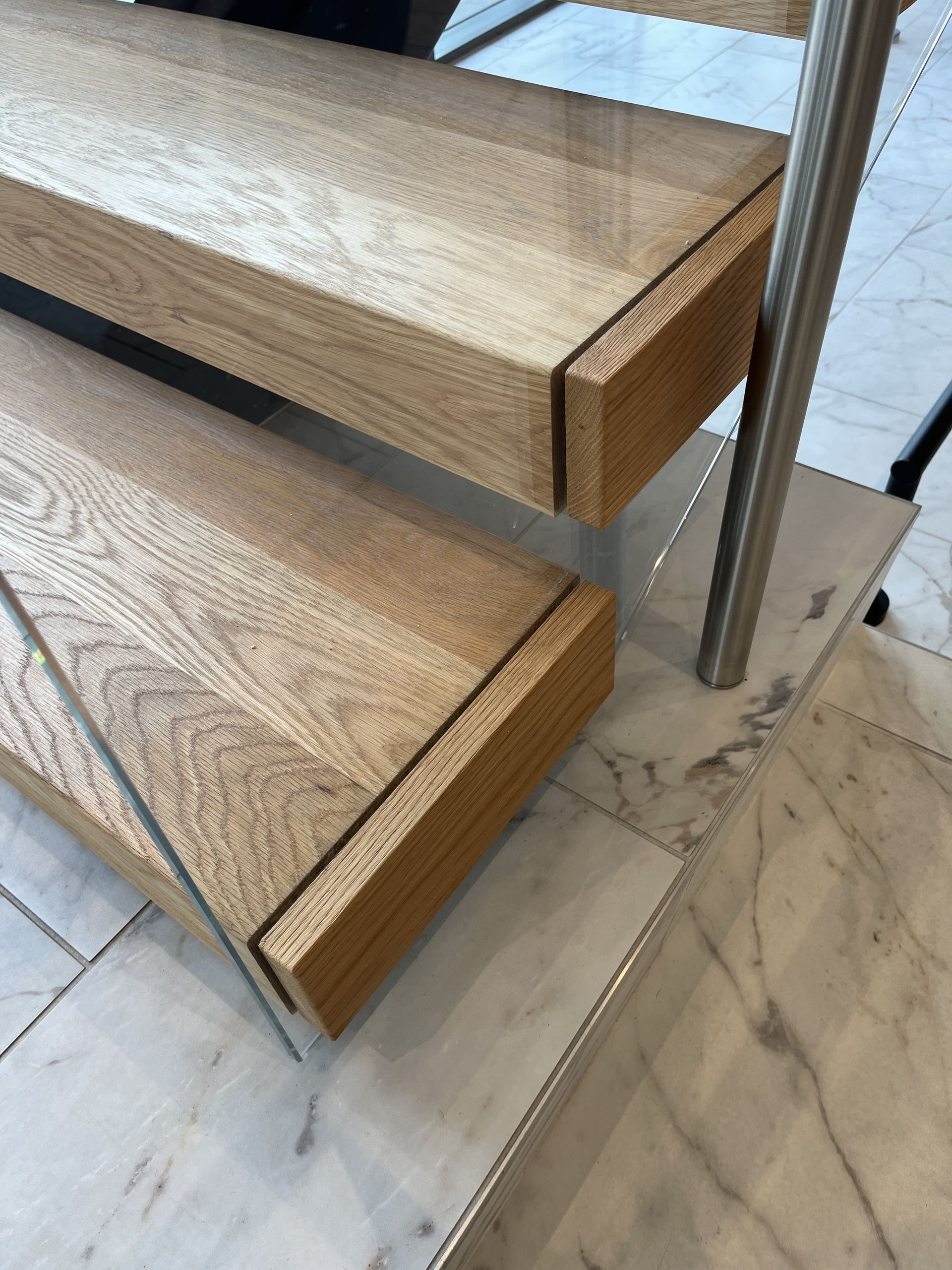 Close-up of wood and glass staircase design