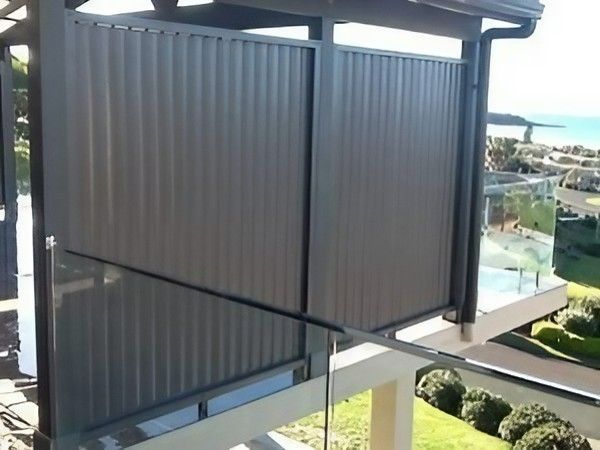 A Balcony with A Black Fence — Topline Aluminium Forster Pty Ltd in Forster, NSW