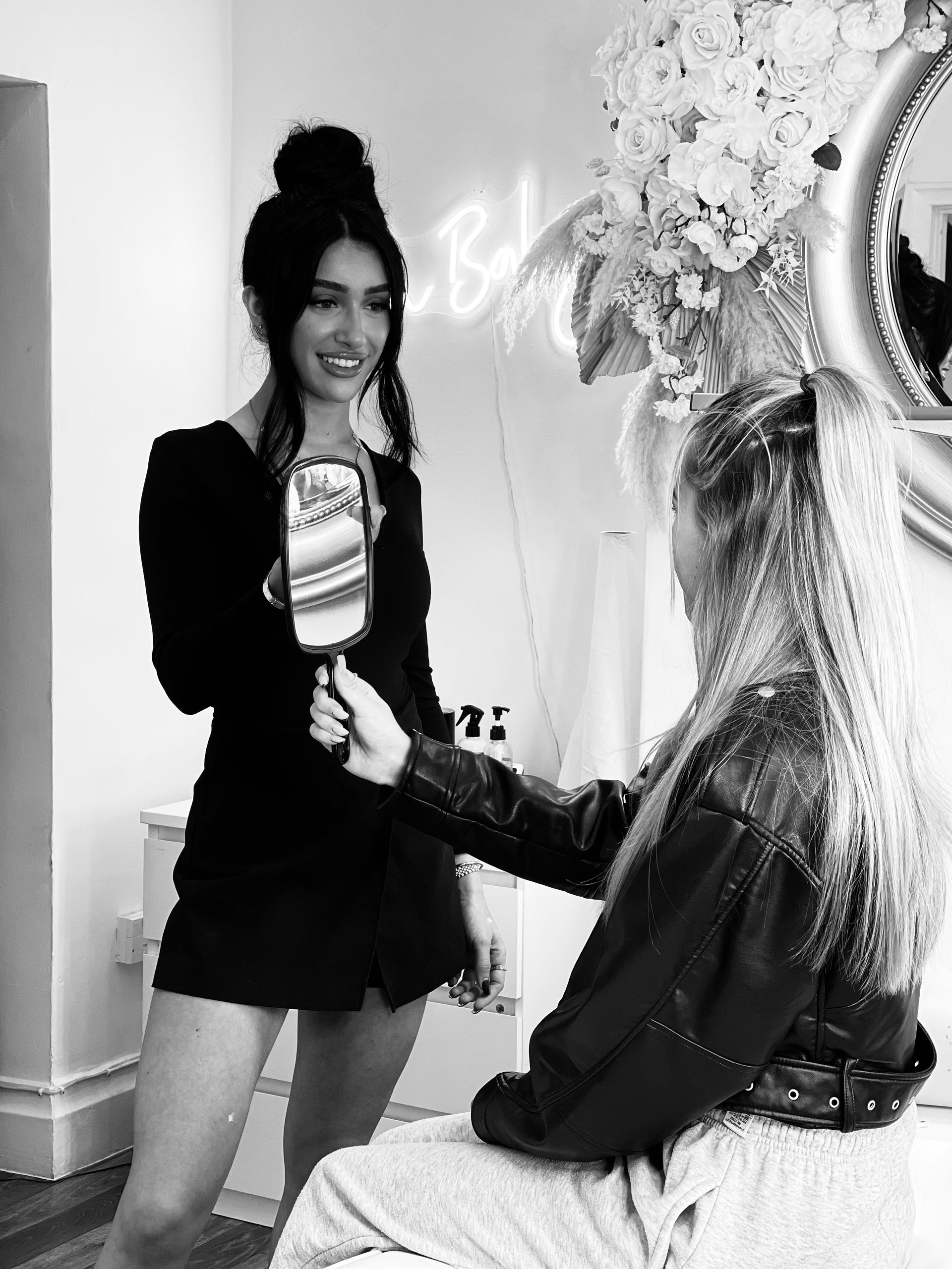 Anya Ely happy client after lash extension treatment.