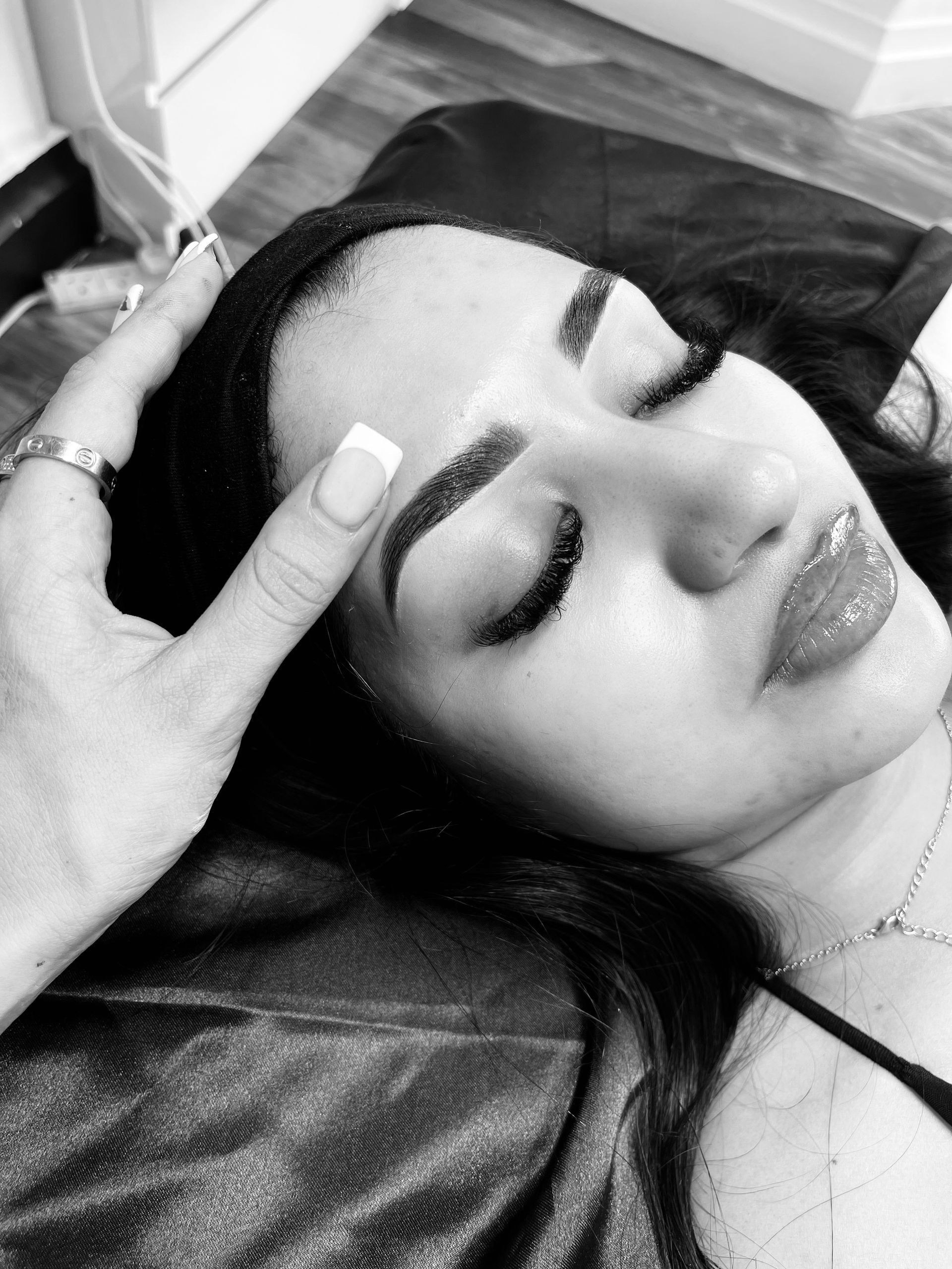 a woman is getting her eyebrows done at Anya Ely Cleveleys