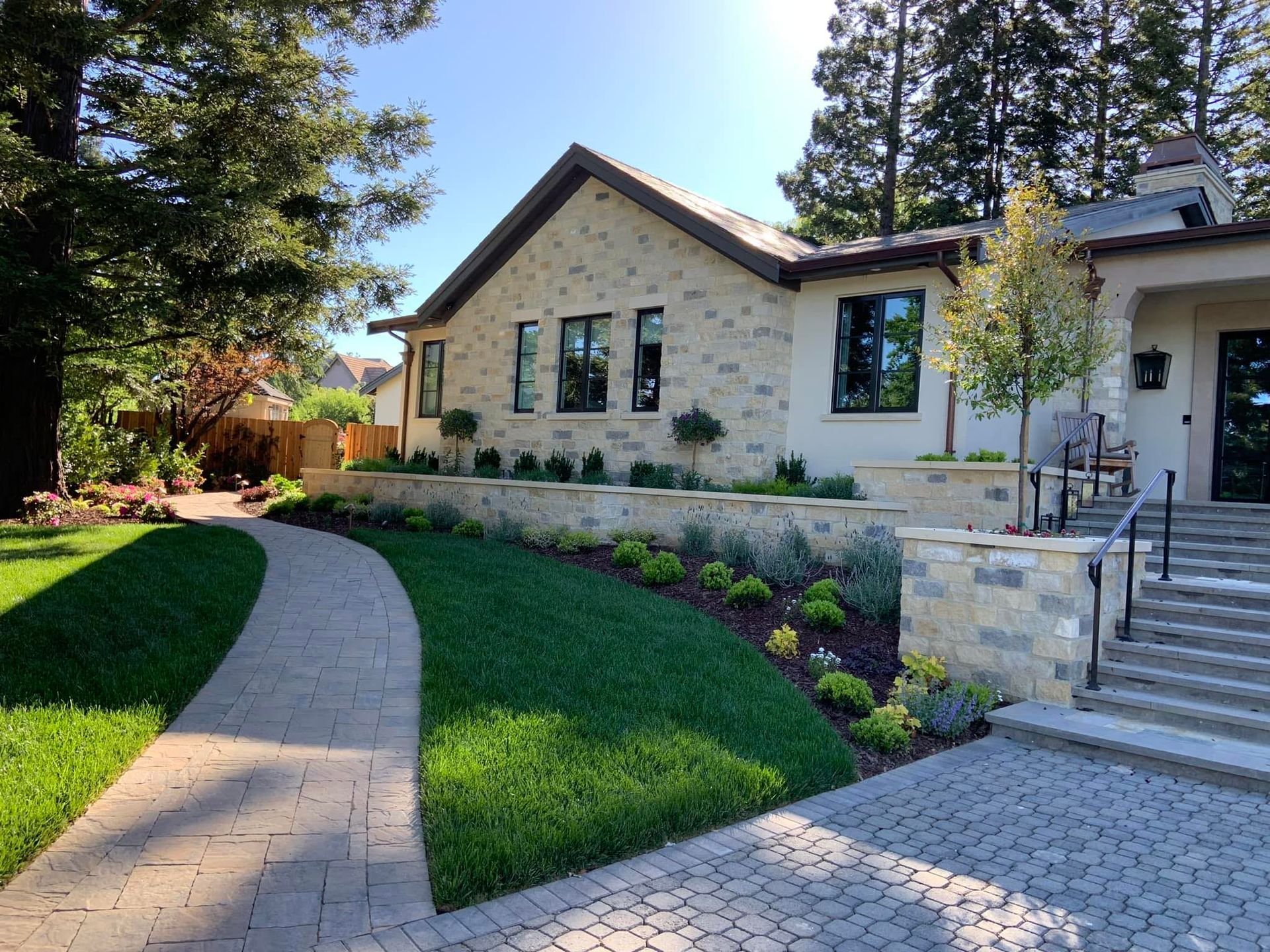 A house with a brick walkway leading to it