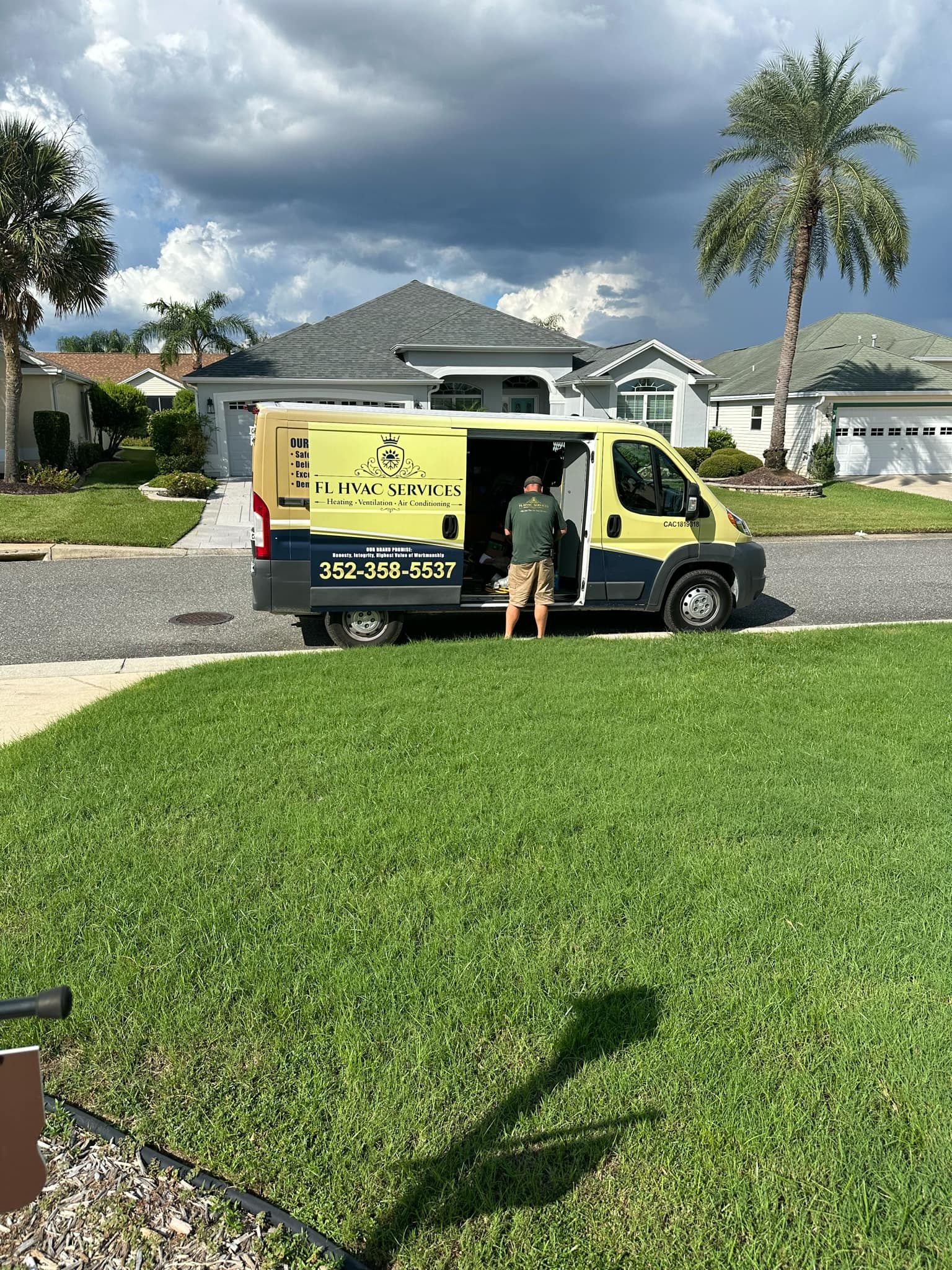 AC technician on an air conditioning repair service