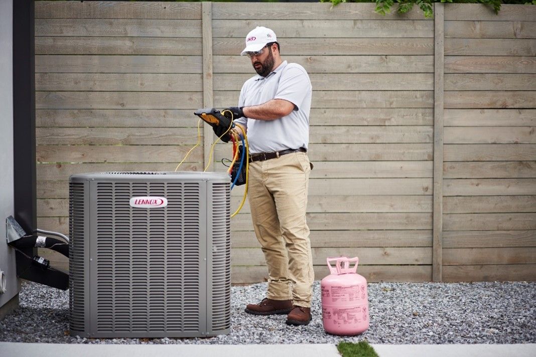 Technician is checking air conditioner