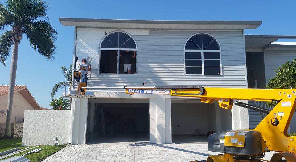 Installing Window With Truck — New Port Richey, FL — Window Masters of Florida