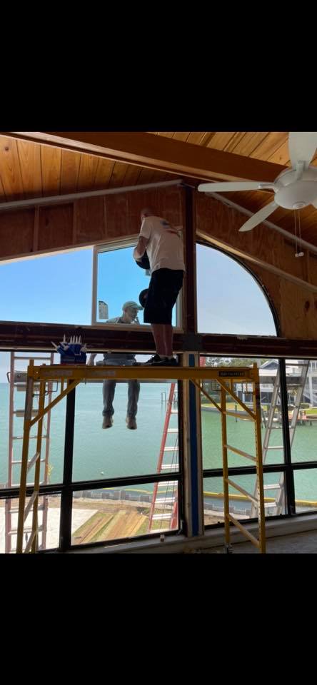 Installing Window With Ladder — New Port Richey, FL — Window Masters of Florida