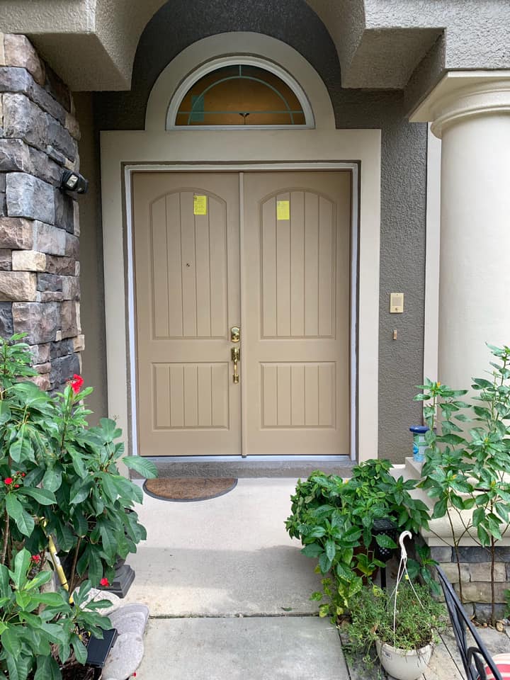 Door With Plants And Mat — New Port Richey, FL — Window Masters of Florida