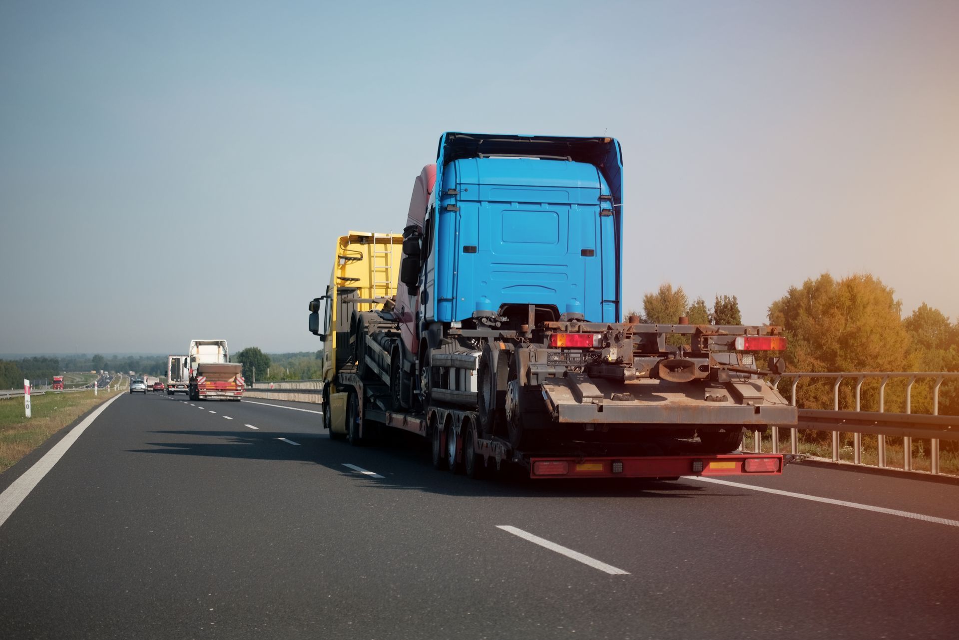 Damaged truck receiving roadside support from a towing service. Damaged truck receiving roadside support from a towing service.