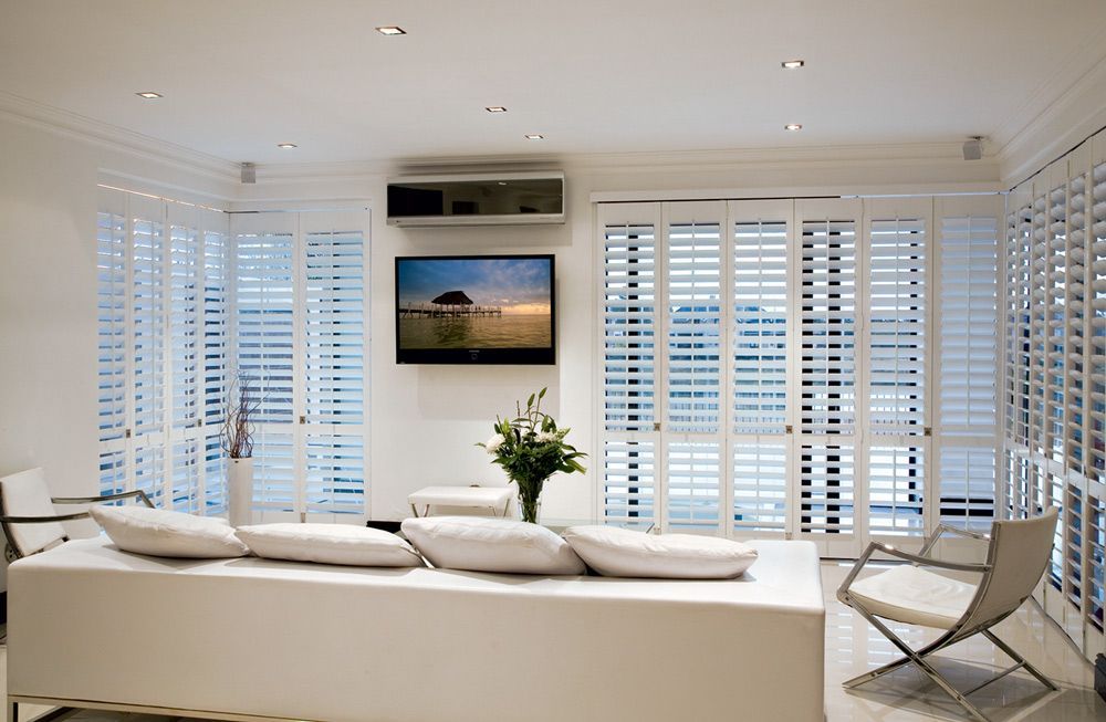A Living Room With White Furniture — TT Shutters & Shading In Ballina, NSW