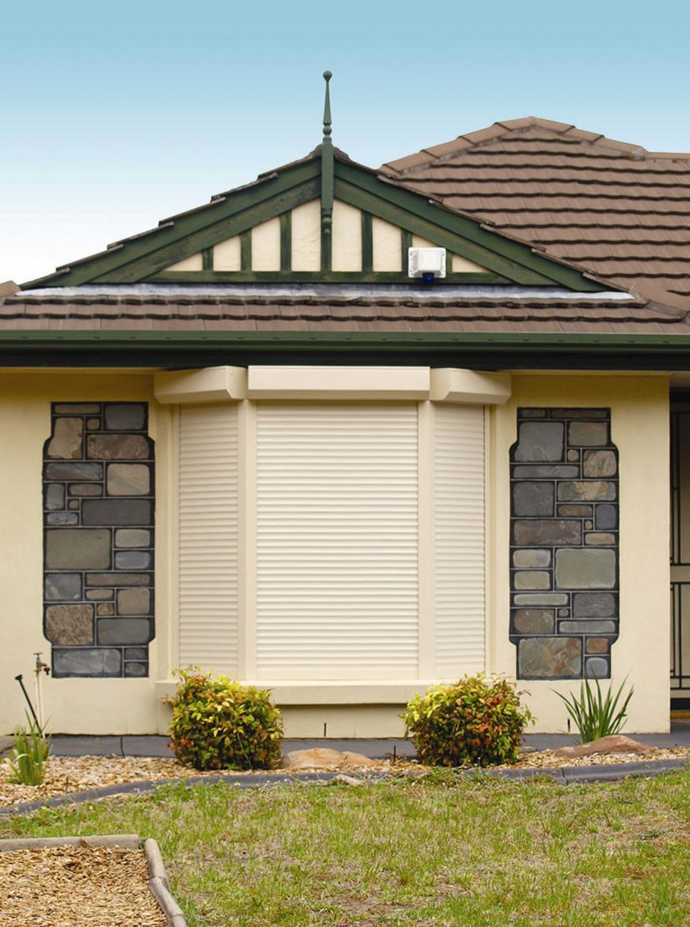 The Front Of A House With Shutters On The Windows — TT Shutters & Shading In Ballina, NSW