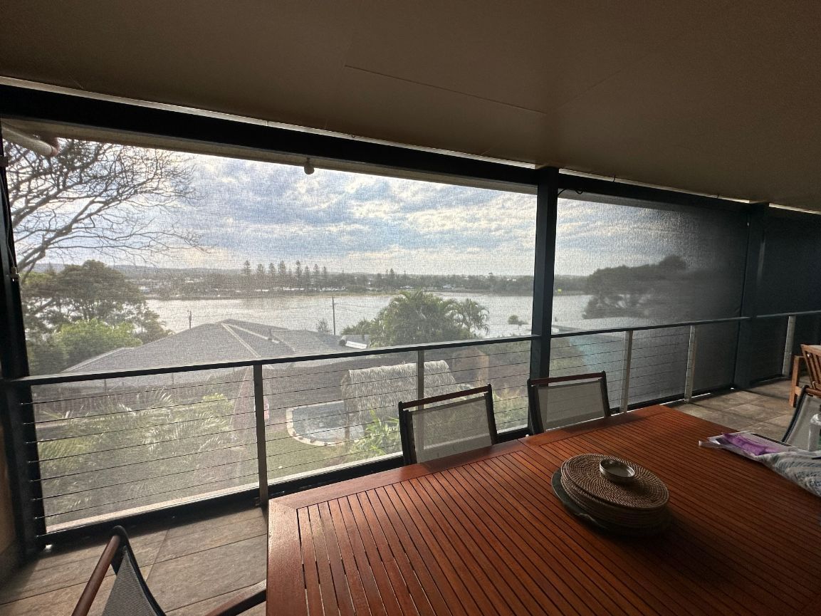 A Table And Chairs With Screen — TT Shutters & Shading In Ballina, NSW