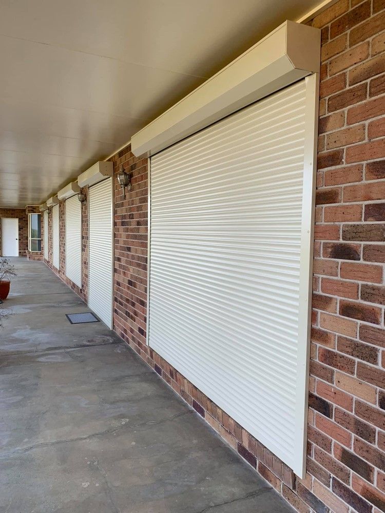 The Front Of A House With Shutters On The Windows — TT Shutters & Shading In Ballina, NSW